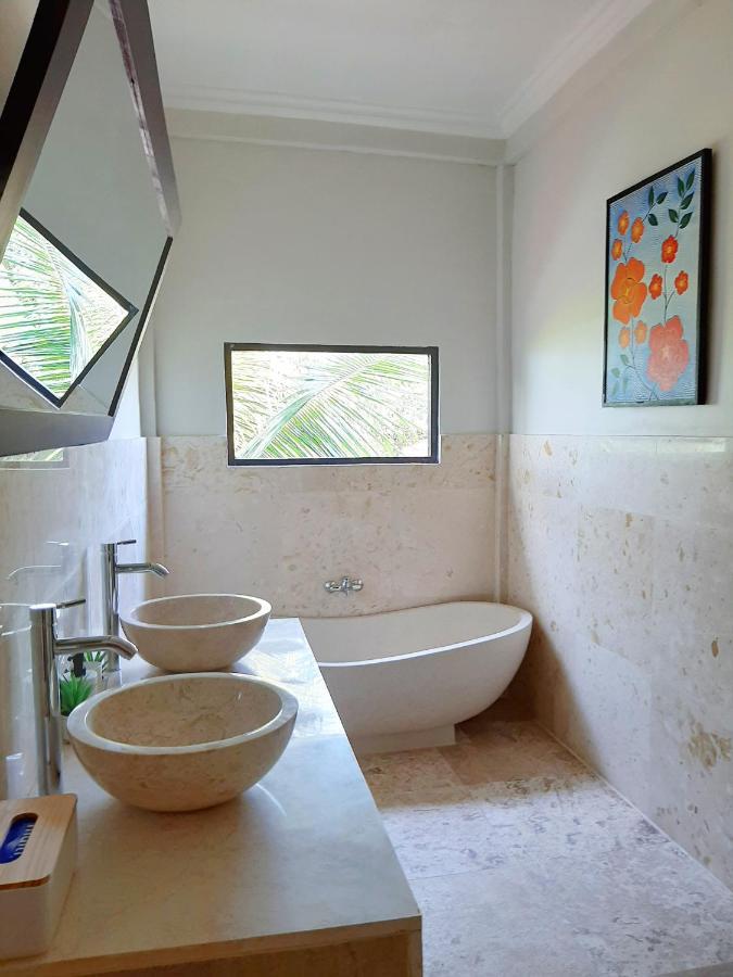 Medewi Manor Aparthotel Airsatang ภายนอก รูปภาพ