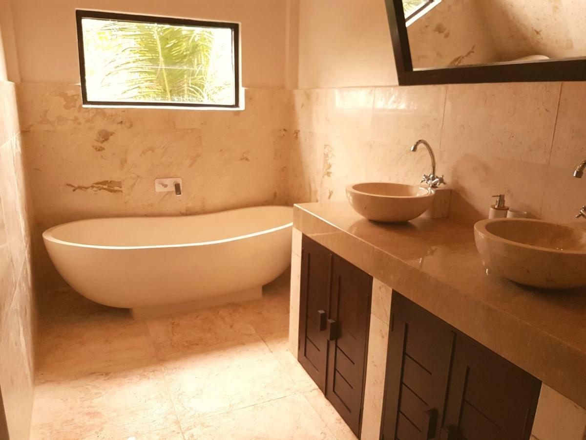 Medewi Manor Aparthotel Airsatang ภายนอก รูปภาพ